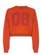 Cropped Long-Sleeved T-Shirt Tops T-shirts & Tops Long-sleeved Orange ...